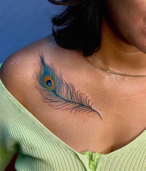 feather tattoo designs|feather with butterfly tattoo designs.